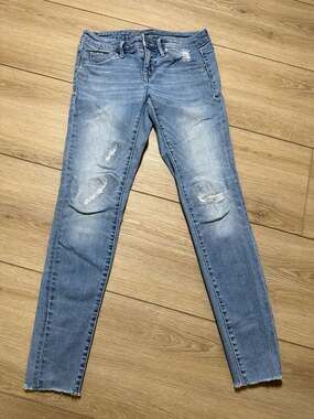 Mossimo Mid-Rise Jeggings Size 0/25 Distressed Raw Hem